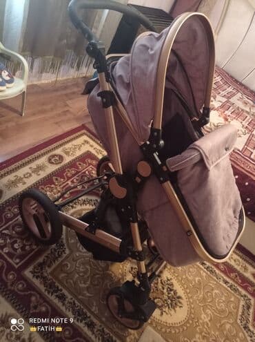 купить детские коляски: Bu uşaq arabası rahat və praktikdir. Qızılgül rəngindədir və müasir — 1
