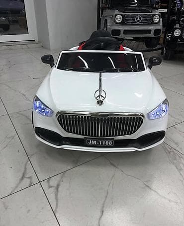 oyuncak masin: Ağ rəngdə, uşaqlar üçün nəzərdə tutulmuş elektrikli minik avtomobili — 1