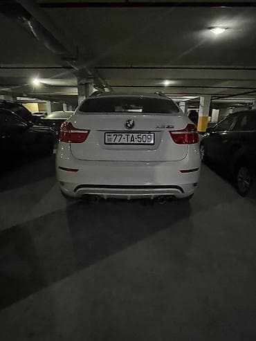 bmw e60: BMW X6, ağ rəng, 4 qapılı kupe-SUV gövdə. Güclü benzin mühərriki və — 3