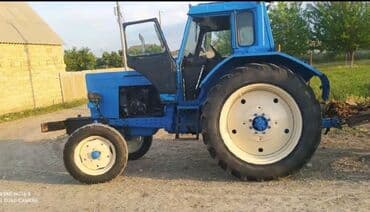 mtz 80 karopka: Mavi rəngli tək kabinalı təkərli traktor - Ön idarəolunan təkər cütü — 3