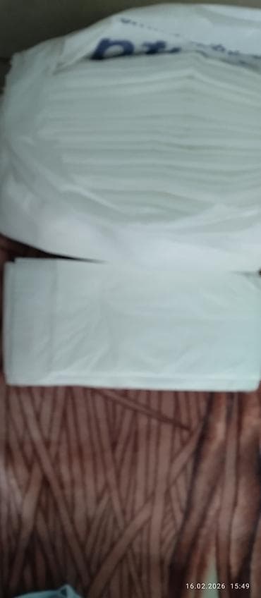 korpu kran: Ağ rəngli korpe altina serilen birdefelik eskiler, bir ededi 1man 20 — 1