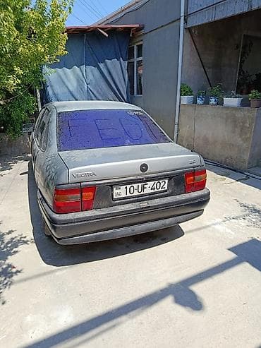 sam diskler: Opel Vectra: 2 l | Sedan — 1