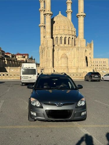 фольксваген тигуан 2 0: Hyundai i30 CW (universal) – tünd boz rəngdə, şəhərdaxili və ailə — 4