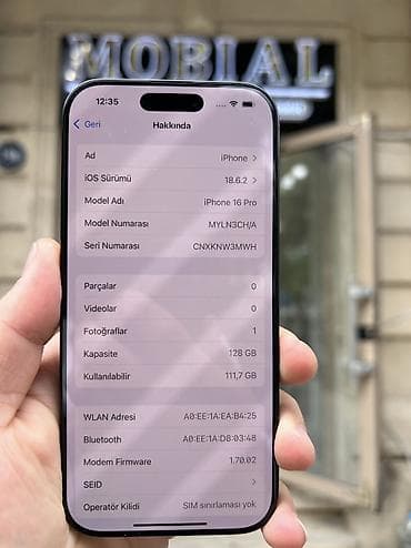 buoy iphone satın: IPhone 16 Pro, 128 GB, Black Titanium, Zəmanət, Simsiz şarj, Face ID — 7