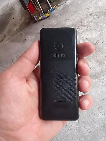 60 kv kondisioner: Düyməli mobil telefon – Philips Xenium seriyası (ön paneldə Fly — 2