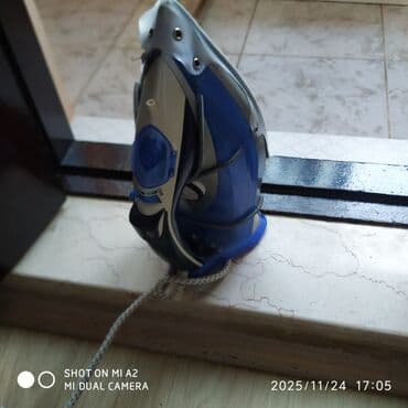 Ventilyatorlar: Buxarlı elektrik ütü Xüsusiyyətlər: - Rəng: mavi/boz - Buxar — 2