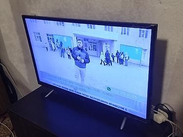 kontur: LED televizor, 32–40 düym arası ekran (təxmini). Nazik çərçivə — 1