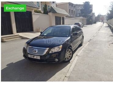 aston martin vanquish 5.9 at: Toyota Avalon – qara rəngli, sedan, avtomatik transmissiya. Əsas — 2