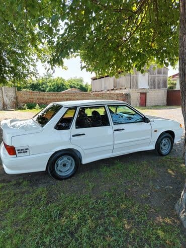 авто азербайджан: Ağ rəngdə, səliqəli görünüşə malik Lada sedan avtomobili. Təkərləri — 4