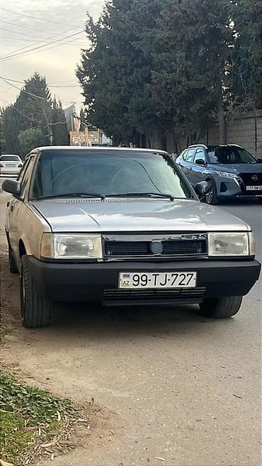 tofas disk: Model: Tofas Şahin (sedan) Rəng: Gümüş/boz Kuzov: 4 qapı, klassik — 2