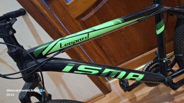 ktm velosipēdi: ISMA markalı, qara rəngli, yaşıl detalları olan dağ velosipedi — 9