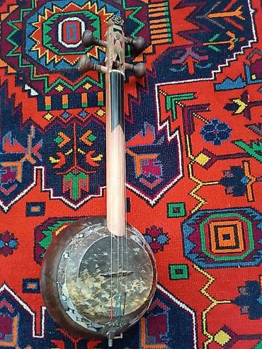 Kamança Xüsusiyyətlər: - 11 simli klassik Azərbaycan tarı -