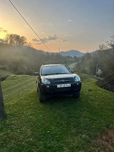 kia rio manitor: Hyundai Tucson: 2 l | 2005 il Ofrouder/SUV — 3