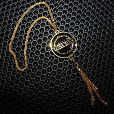 maşın ucun telefon tutacaqları: Asılqan NİSSAN — 1