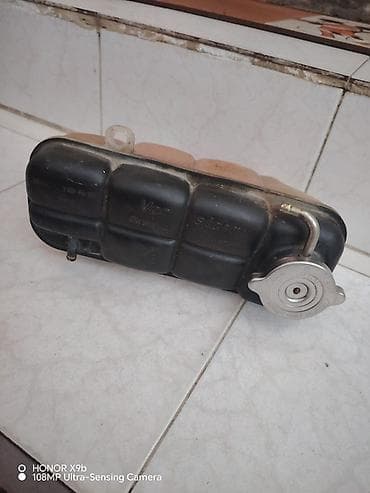 Mercedec w202 orgınal üsden çıxma qapağla bir yerde