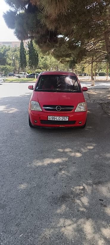 nissan note mini: Opel Meriva, qırmızı rəngli, şəhər və ailə istifadəsi üçün rahat — 5