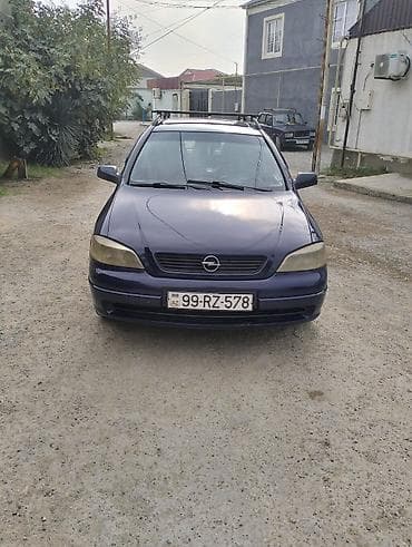 lapet satisi: Opel Astra Caravan (universal) – tünd mavi rəng. Xüsusiyyətlər: - — 7