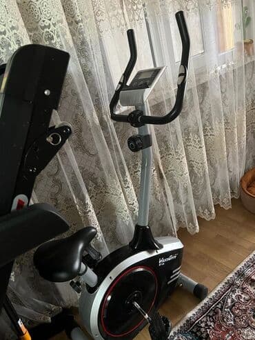 qaraqan birinci addim: Voosher H10 model nömrəli qara və boz rəngli məşq velosipedi. Bu — 1