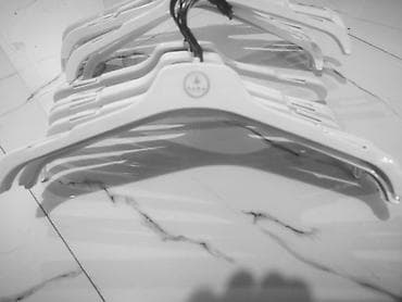 ev dəstləri: === PART 1: TEXTUAL DESCRIPTION === Bu məhsul, geyimlərin səliqəli — 2