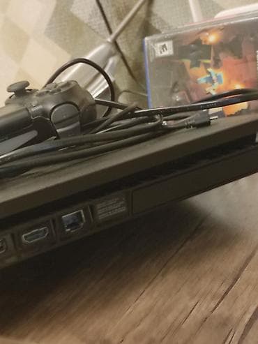 irşad electronics ps4: PlayStation 4 Slim oyun konsolu və oyunlarla bir yerdə. PlayStation — 2