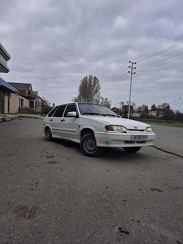 qalofqa vaz: Avtomobil: Lada Samara (VAZ 2114) hatchback, ağ rəng Kuzov: 5 qapılı — 7