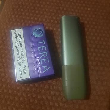 часы смарт: IQOS ILUMA cihazı + TEREA Purple Wave sticks (qutusu təsvir olunur) — 2
