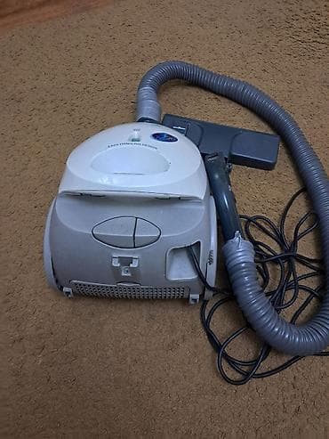 tost aparati: Samsung tozsoran – 1300W, torbalı tip. Xüsusiyyətlər: - Güc: 1300W — 2