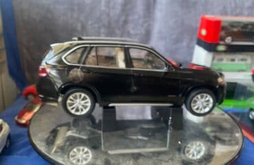 metbex tavan modelleri: Коллекционная модель BMW X5 F15 sapphire black 2012 Paragon Models — 12