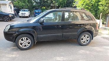 Hyundai Tucson, qara rəng, 5 qapılı SUV. İli 2006-nın sonu(2007 — 6