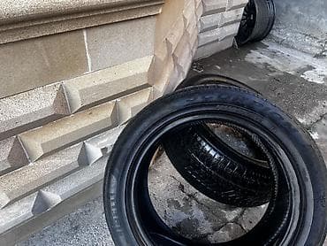 passat diski: 2 ədəd avtomobil şini satılır. Şinlərin üzərində görünən ölçü **255/50 — 3