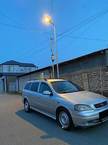 turbo az gazel: Opel Astra Caravan (universaI) – gümüşü rəng Xüsusiyyətlər: - Kuzov — 4