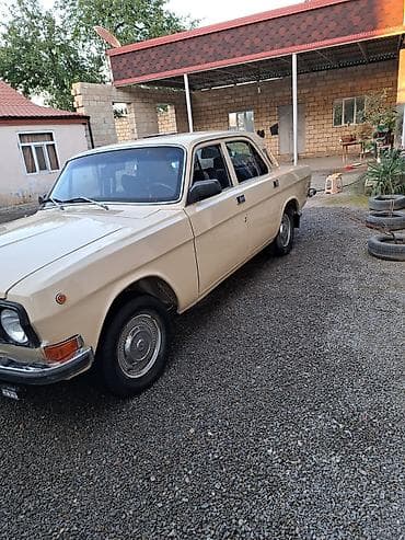 prius tekeri: Model: GAZ Volga (sedan) Xüsusiyyətlər: - Klasik bej rəngli kuzov — 2