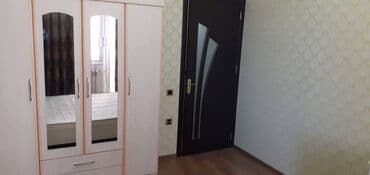 tam temirli menziller: İnşaatçılar metrosunun çıxısında inşaat binasında 12 mertebeli — 21