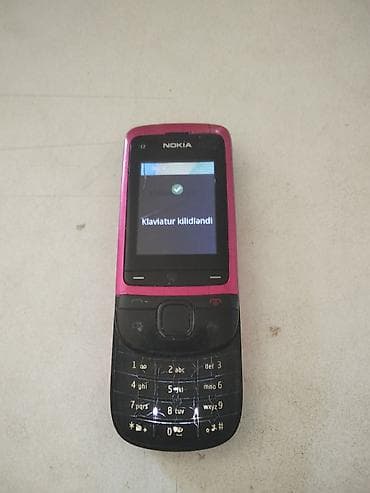 philips xenium 9@9h: Nokia rəng - Çəhrayı, Düyməli — 1