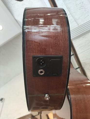 smiger: Elektro akustik gitara Model:Smiger FN 20 Üst: Şam ağacı Qol: Gül — 1