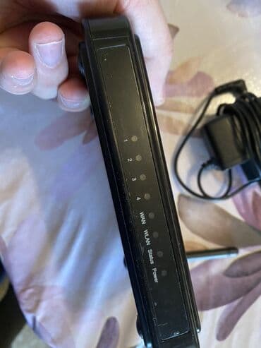tp link modem qiymeti: Upvel şirkətindən olan qara rəngli router. Evdə və ya ofisdə internetə — 3
