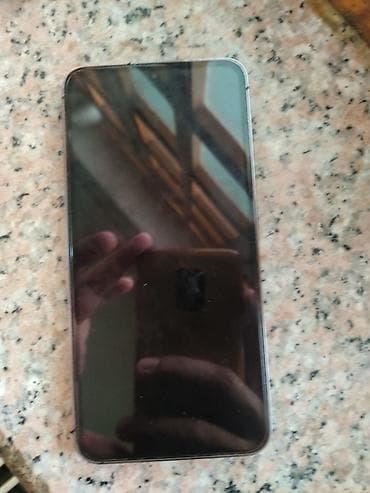 kontakt home redmi 13: Samsung Galaxy S23, rəng - Boz, Simsiz şarj — 4