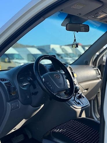 keys sat: Kia Carnival: 2.2 l | 2011 il Van/Minivan — 9