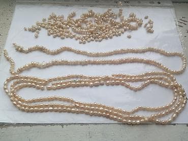 Təbii inci muncuq dəsti 150 qramdır Təbii keş mirvarisidir -