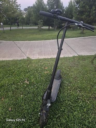 Elektrik nəqliyyatı: Elektrik skuter Xüsusiyyətlər: - Rəng: qara, metal gövdə - Təkərlər — 6