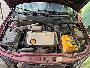 Opel: Opel Astra Caravan (Universal), qırmızı gövdə yalnız kredetlə — 1