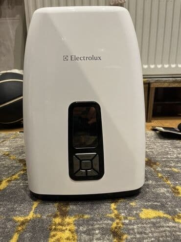 аспиратор для кухни: Electrolux hava nəmləndiricisi - Rəng: ağ-qara korpus - Üst hissədə — 1