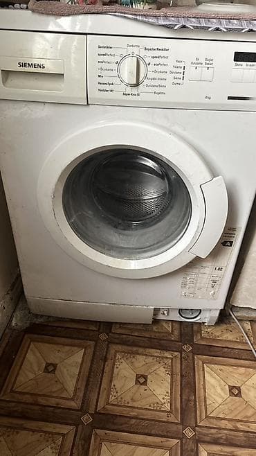 demir qapi darvaza: Siemens önyükləməli paltaryuyan maşın - Yük tutumu: 6 kq - Enerji — 1