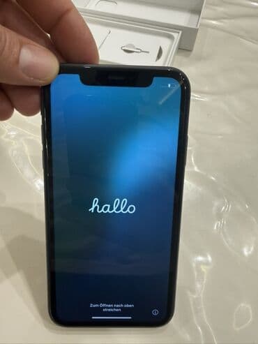 2 ci el apple 11: IPhone 11, 128 GB, Qara, Face ID — 3