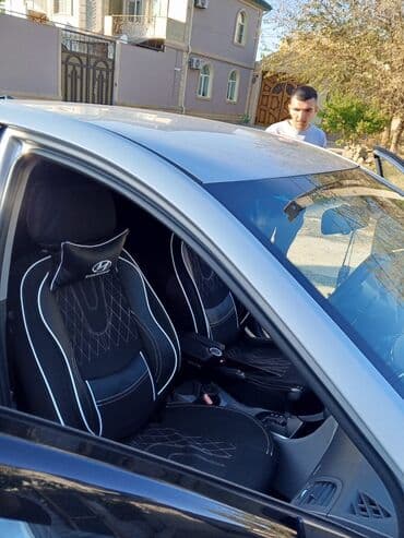 kia sportage 2006: Hyundai Accent: 1.4 l | 2016 il Sedan — 7