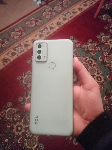 asus zenfone 3: TCL smartfon - Marka/model: TCL (arxa qapaqda TCL loqosu) - Rəng — 1