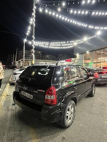 huday aksent: Hyundai Tucson: 2 l | 2007 il Krossover — 4