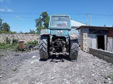 radiato: Traktor MTZ (Belarus) tipli, mavi rəngli, kabinəli. Texniki — 1