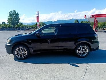 man sat: Mitsubishi Airtrek: 2 l | 2002 il 258000 km Van/Minivan — 6