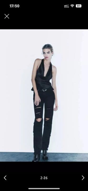 zeynep bastik baku: Zara Qara rəngli, yırtıq detallı cins şalvar. Dizlərdə və digər — 25